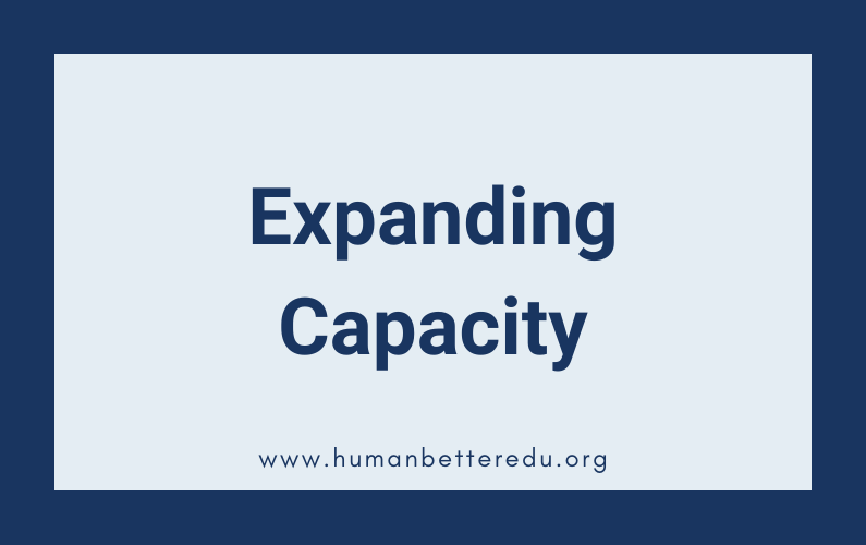 Blue header reading "Expanding Capacity"